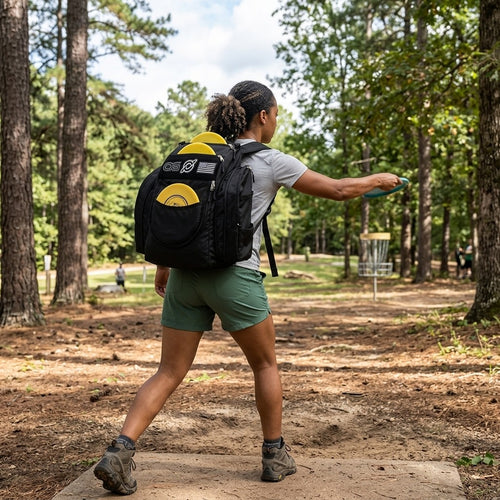 Discology Disc Golf OG Black V3 Disc Golf Bag | 26+ Disc Capacity | Premium Disc Golf Backpack Bag | Durable Design | 2 Large Side Compartments | Three Patches Included